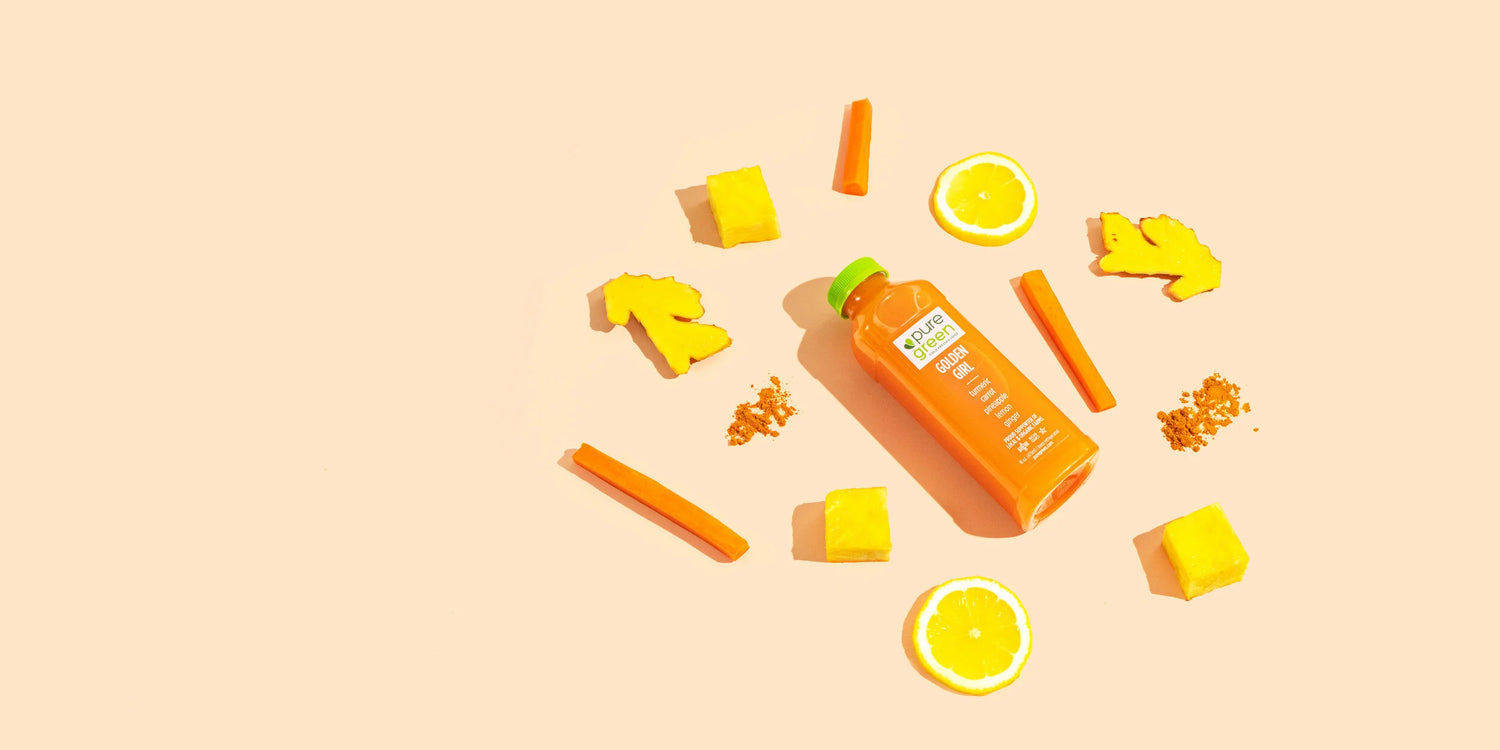 Pure Green Golden Girl cold-pressed juice with turmeric root, ground turmeric, carrot, pineapple and lemon